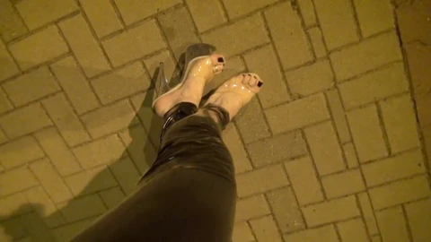 Public crossdressing in transparent high heels and tight leggings