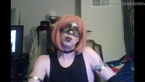 Redhead crossdresser performs live cam show in goth style