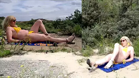 Sinnlicher Spaziergang und verführerisches Sonnenbaden im Bikini an den Dünen