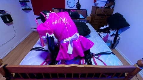 Restrained and overpowered crossdresser maid in self-bondage