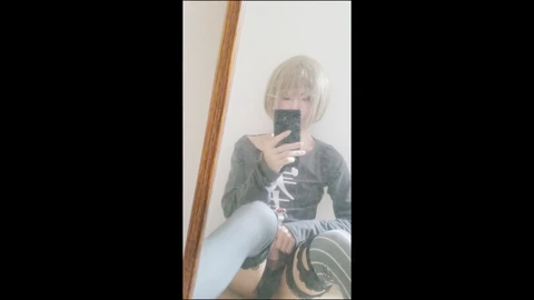 Seductive femboy indulges in mirror play while milking himself